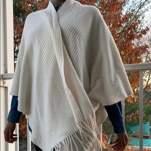 Cream shoulder scarf.